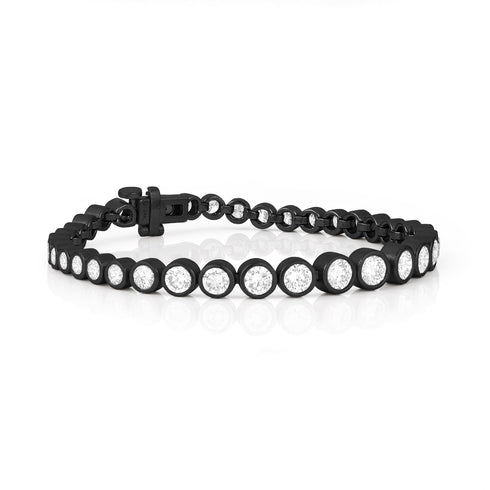 Dominique Cohen round bezels white diamond tapering tennis bracelet in 18k black gold<span class='visuallyhidden'>; shop help at 760-978-9297.</span>